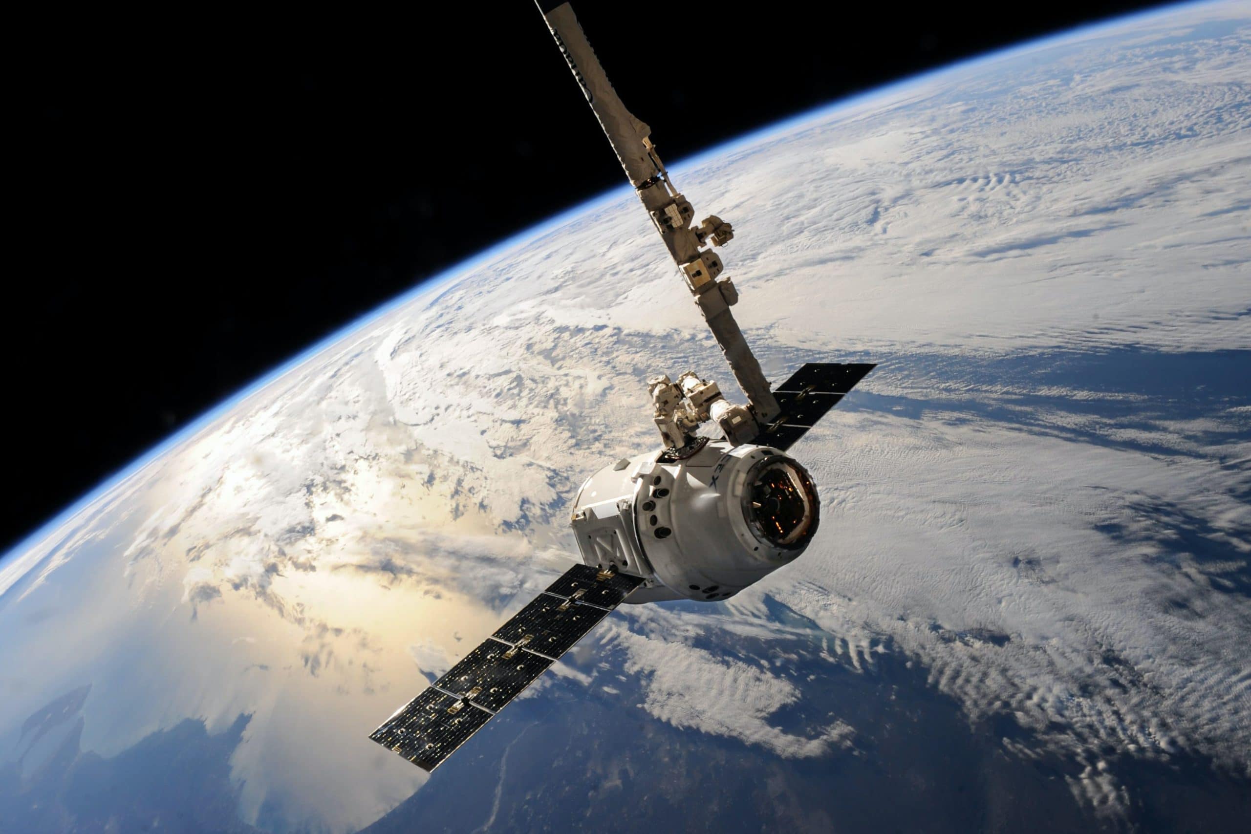 A photo of a satellite in space with the backdrop of Earth. Satellites will be a key component of 5G adoption worldwide that will expand connectivity but also poses new cybersecurity risks. Read more to learn what they are and how to prepare.